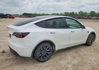 2023 Tesla Model Y, daño Lateral, Copart lote 49875856, foto 3 de 14