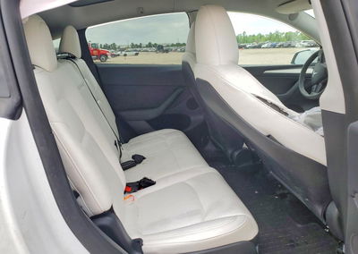 2023 Tesla Model Y, daño Lateral, Copart lote 49875856, foto 10 de 14