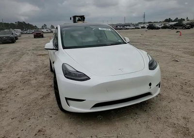 2023 Tesla Model Y, daño Lateral, Copart lote 49875856, foto 13 de 14