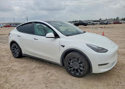 2023 Tesla Model Y, daño Lateral, Copart lote 49875856, foto 4 de 14