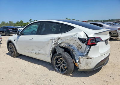 2025 Tesla Model Y, Rear End damage, Copart lot 59955986, photo 2 of 13