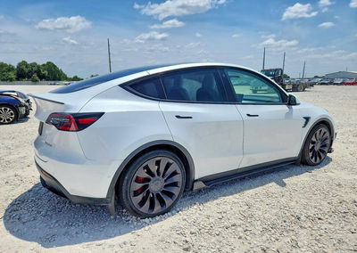 2022 Tesla Model Y, daño Lateral, Copart lote 62529156, foto 3 de 6
