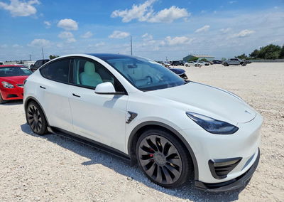 2022 Tesla Model Y, daño Lateral, Copart lote 62529156, foto 4 de 6