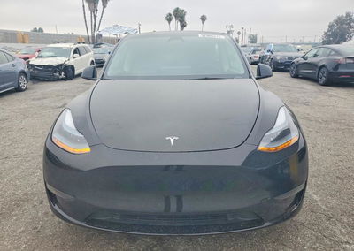2024 Tesla Model Y, daño Lateral, Copart lote 52966516, foto 5 de 16