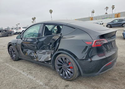 2024 Tesla Model Y, daño Lateral, Copart lote 52966516, foto 2 de 16