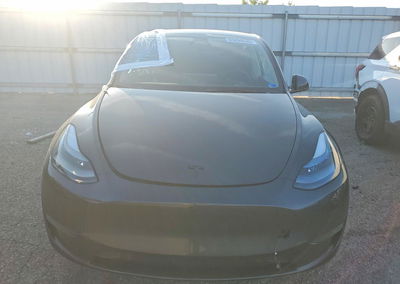 2024 Tesla Model Y, daño Lateral, Copart lote 65890536, foto 5 de 12