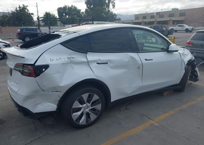 2023 Tesla Model Y Awd/long Range Dual Motor All-wheel Drive, daño Normal Wear & Tear, Iaai lote 46021985, foto 4 de 6