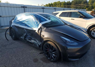 2024 Tesla Model Y, daño Lateral, Copart lote 65890536, foto 4 de 12