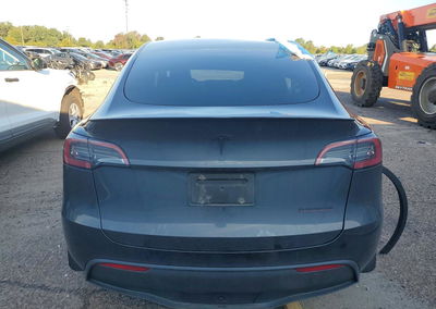 2024 Tesla Model Y, daño Lateral, Copart lote 65890536, foto 6 de 12