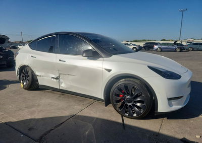 2024 Tesla Model Y, daño Lateral, Copart lote 65233256, foto 4 de 12