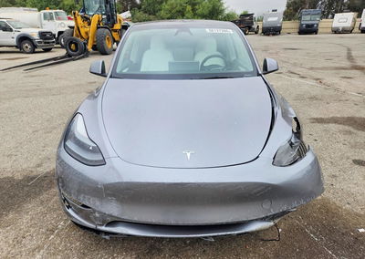 2024 Tesla Model Y, uszkodzenie: Bok, Copart lot 58137386, zdjęcie 5 z 14