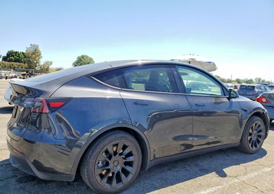 2024 Tesla Model Y, daño Lateral, Copart lote 63420026, foto 3 de 14