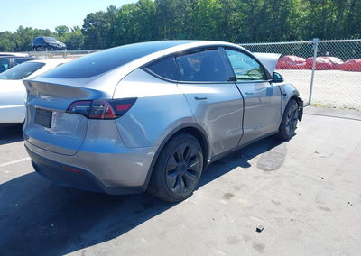 2025 Tesla Model Y Long Range Dual Motor All-wheel Drive, Front End damage, Iaai lot 45280708, photo 4 of 15
