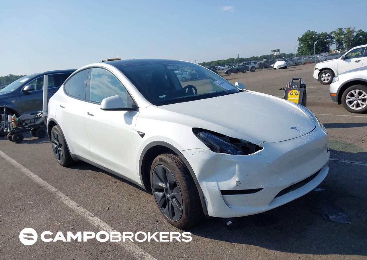 2025 Tesla Model Y Long Range Dual Motor Rear-wheel Drive, daño Lateral izquierdo, Iaai lote 45591865