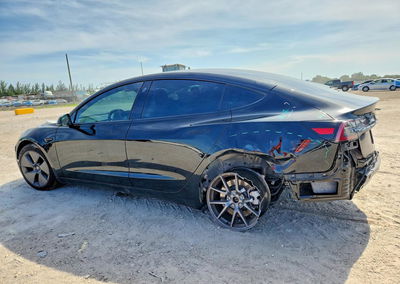 2023 Tesla Model 3, daño Trasero, Copart lote 64933356, foto 2 de 13