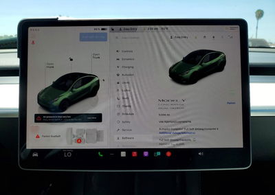 2024 Tesla Model Y, daño Lateral, Copart lote 63420026, foto 9 de 14
