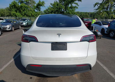 2025 Tesla Model Y Long Range Dual Motor Rear-wheel Drive, daño Lateral izquierdo, Iaai lote 45591865, foto 15 de 15