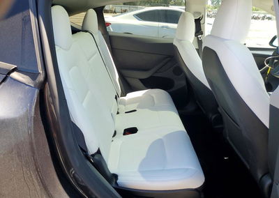 2024 Tesla Model Y, daño Lateral, Copart lote 63420026, foto 10 de 14