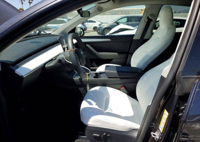 2024 Tesla Model Y, daño Lateral, Copart lote 63420026, foto 7 de 14
