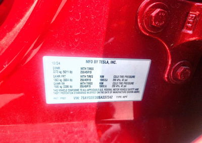 2025 Tesla Model Y, daño Frontal, Copart lote 60500486, foto 13 de 15