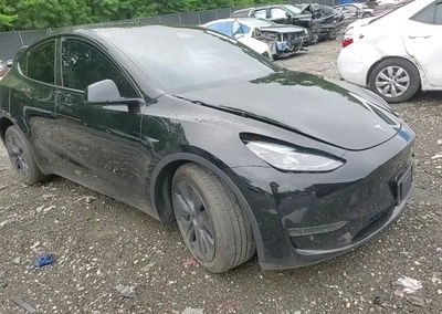2025 Tesla Model Y, daño Frontal, Copart lote 59980206, foto 13 de 14