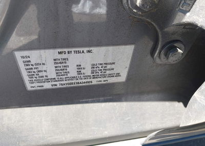 2025 Tesla Model Y Long Range Dual Motor All-wheel Drive, Front End damage, Iaai lot 45280708, photo 9 of 15