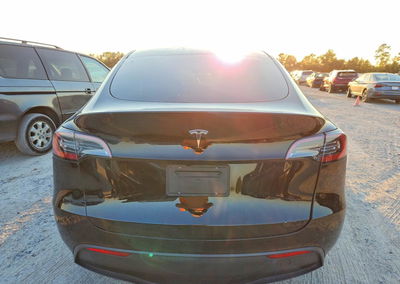 2025 Tesla Model Y, daño Lateral, Copart lote 71084166, foto 6 de 12