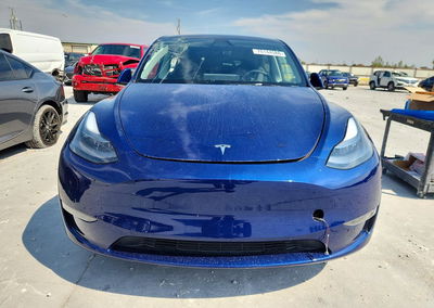 2024 Tesla Model Y, daño Lateral, Copart lote 70144586, foto 5 de 12