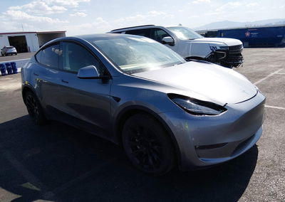 2024 Tesla Model Y Long Range Dual Motor All-wheel Drive, daño Lateral izquierdo, Iaai lote 45679001