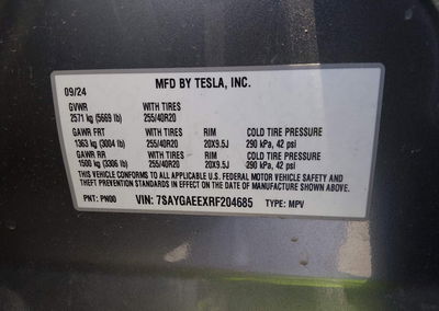 2024 Tesla Model Y Long Range Dual Motor All-wheel Drive, daño Lateral izquierdo, Iaai lote 45679001, foto 9 de 23