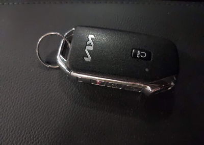 2023 Kia Sportage Sx-prestige, daño Frontal, Iaai lote 45701233, foto 11 de 18