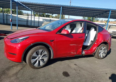 2023 Tesla Model Y, daño Lateral, Copart lote 66609786