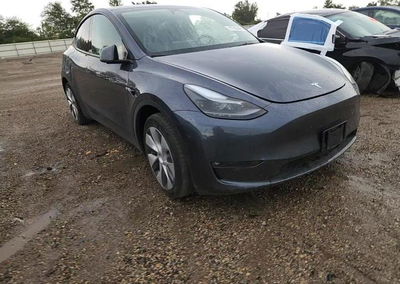 2023 Tesla Model Y, daño Lateral, Copart lote 67203446, foto 13 de 14