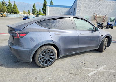 2023 Tesla Model Y, All Over damage, Copart lot 64097296, photo 3 of 14