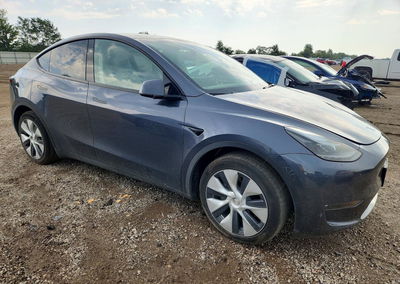 2023 Tesla Model Y, daño Lateral, Copart lote 67203446, foto 4 de 14
