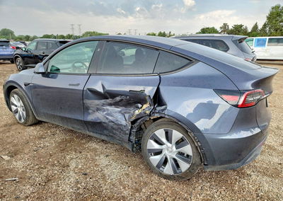 2023 Tesla Model Y, daño Lateral, Copart lote 67203446, foto 2 de 14