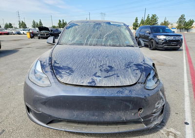 2023 Tesla Model Y, All Over damage, Copart lot 64097296, photo 5 of 14