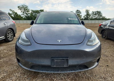 2023 Tesla Model Y, daño Lateral, Copart lote 67203446, foto 5 de 14