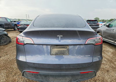 2023 Tesla Model Y, daño Lateral, Copart lote 67203446, foto 6 de 14