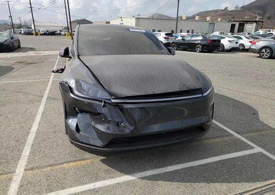 2026 Tesla Model Y, daño Trasero, Copart lote 69431896, foto 13 de 14
