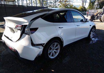 2023 Tesla Model Y Awd/long Range Dual Motor All-wheel Drive, Rear damage, Iaai lot 45906044, photo 4 of 19