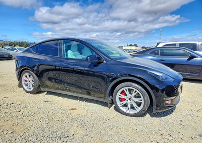 2023 Tesla Model Y, daño Lateral, Copart lote 67607716, foto 4 de 12