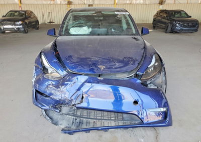 2023 Tesla Model Y, daño Frontal, Copart lote 65962736, foto 5 de 14