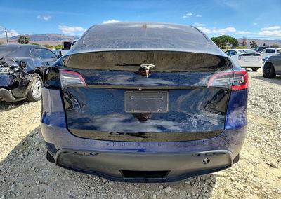 2023 Tesla Model Y, daño Lateral, Copart lote 67607716, foto 6 de 12