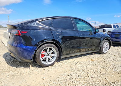2023 Tesla Model Y, daño Lateral, Copart lote 67607716, foto 3 de 12