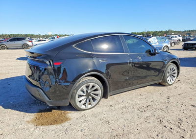 2026 Tesla Model Y, daño Lateral, Copart lote 73388515, foto 3 de 12