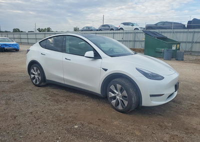 2023 Tesla Model Y, daño Lateral, Copart lote 70897166, foto 4 de 12