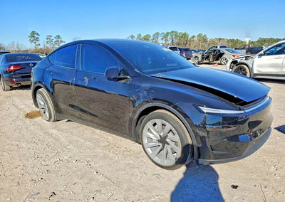 2026 Tesla Model Y, daño Lateral, Copart lote 73388515, foto 4 de 12