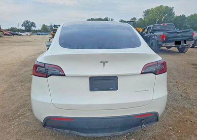 2023 Tesla Model Y, daño Lateral, Copart lote 70897166, foto 6 de 12