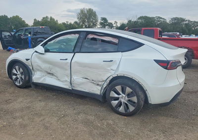 2023 Tesla Model Y, daño Lateral, Copart lote 70897166, foto 2 de 12
